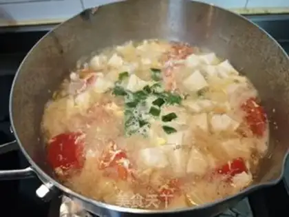 Make Tomato egg tofu soup step 8