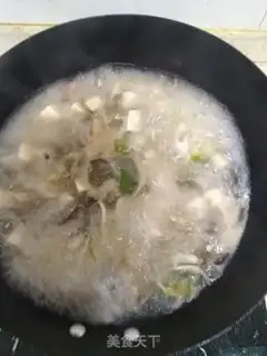 Make Mushroom tofu pork soup step 7