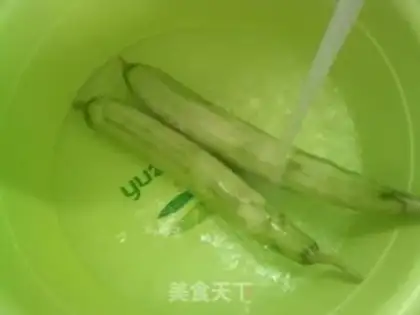 Make Squeeze the pickles and make the leaves step 1