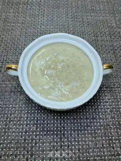 Make Milk oatmeal and egg congee step 8