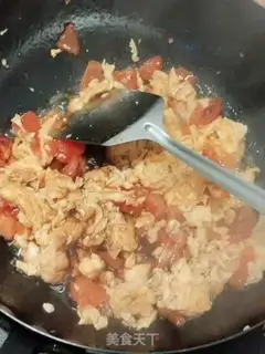 Make Tomato fried eggs step 14
