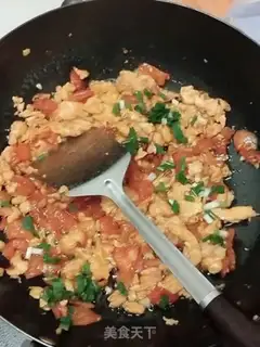 Make Tomato fried eggs step 15