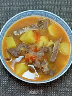 Make Tomato potato tailbone soup step 14