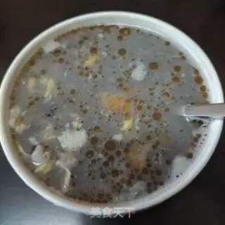 Make Five black oatmeal egg porridge step 6